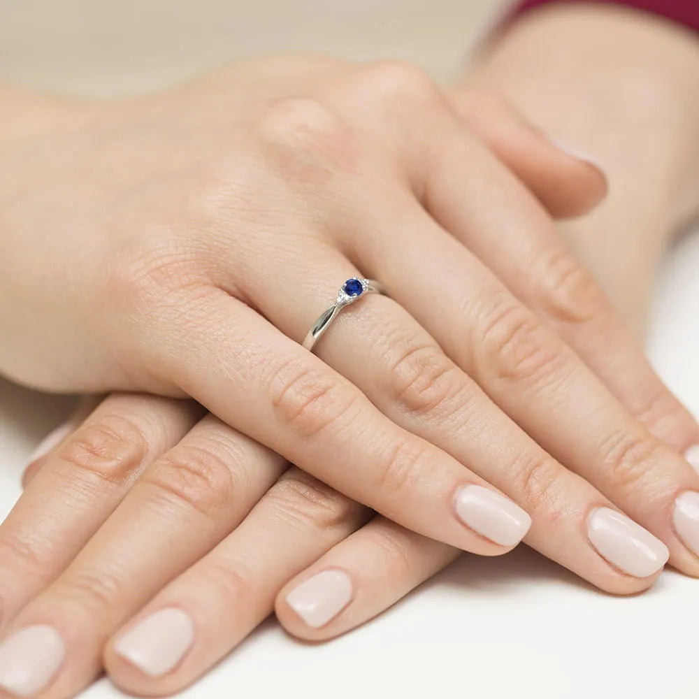 gold-ring-with-0-15ct-sapphire-and-0-03ct-diamonds-w0428-sab-01