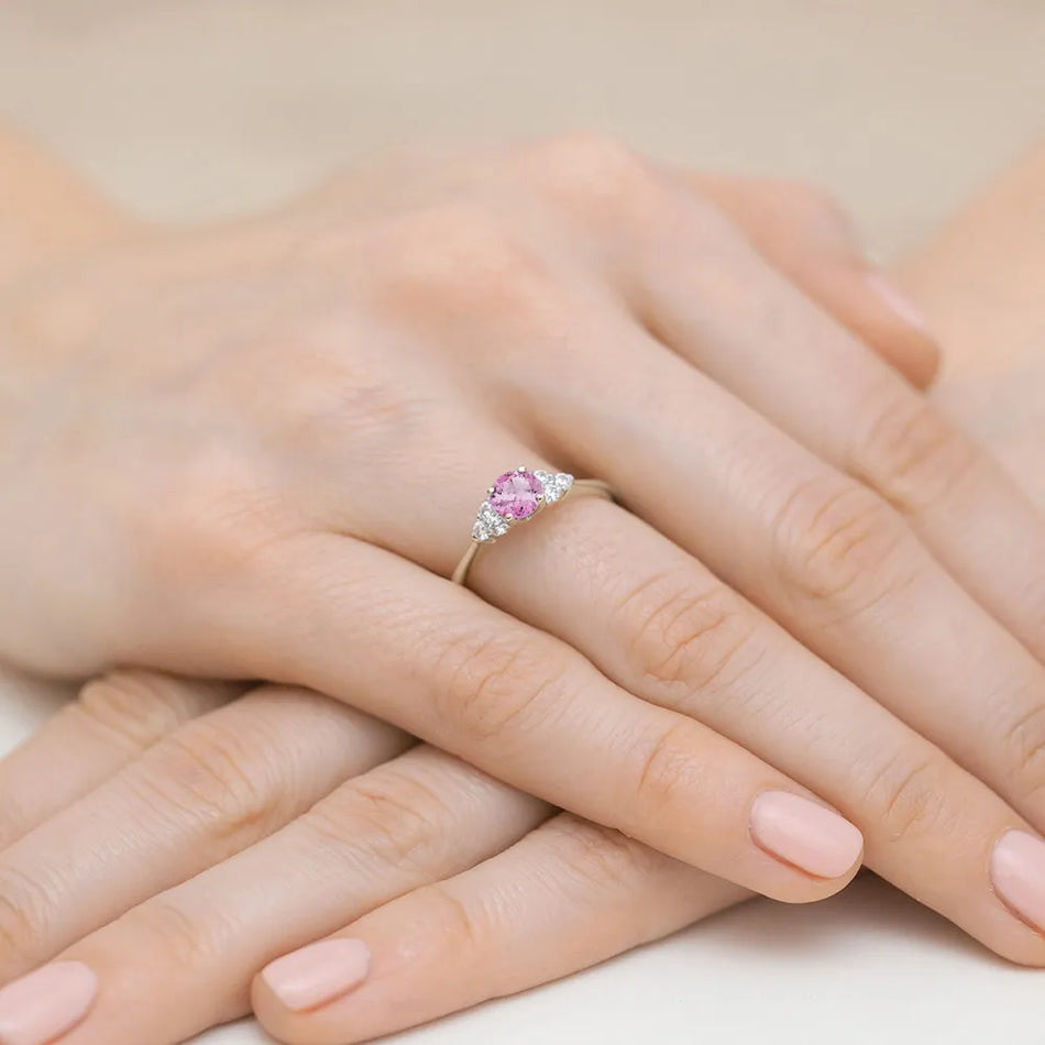 gold-ring-with-0-60ct-pink-topaz-and-0-18ct-diamonds-w0451-top-01