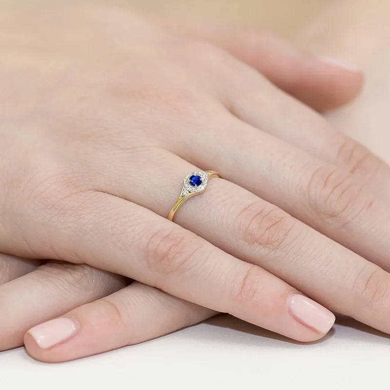 14-karat-goldring-mit-blauem-zirkonia-w056-585-g
