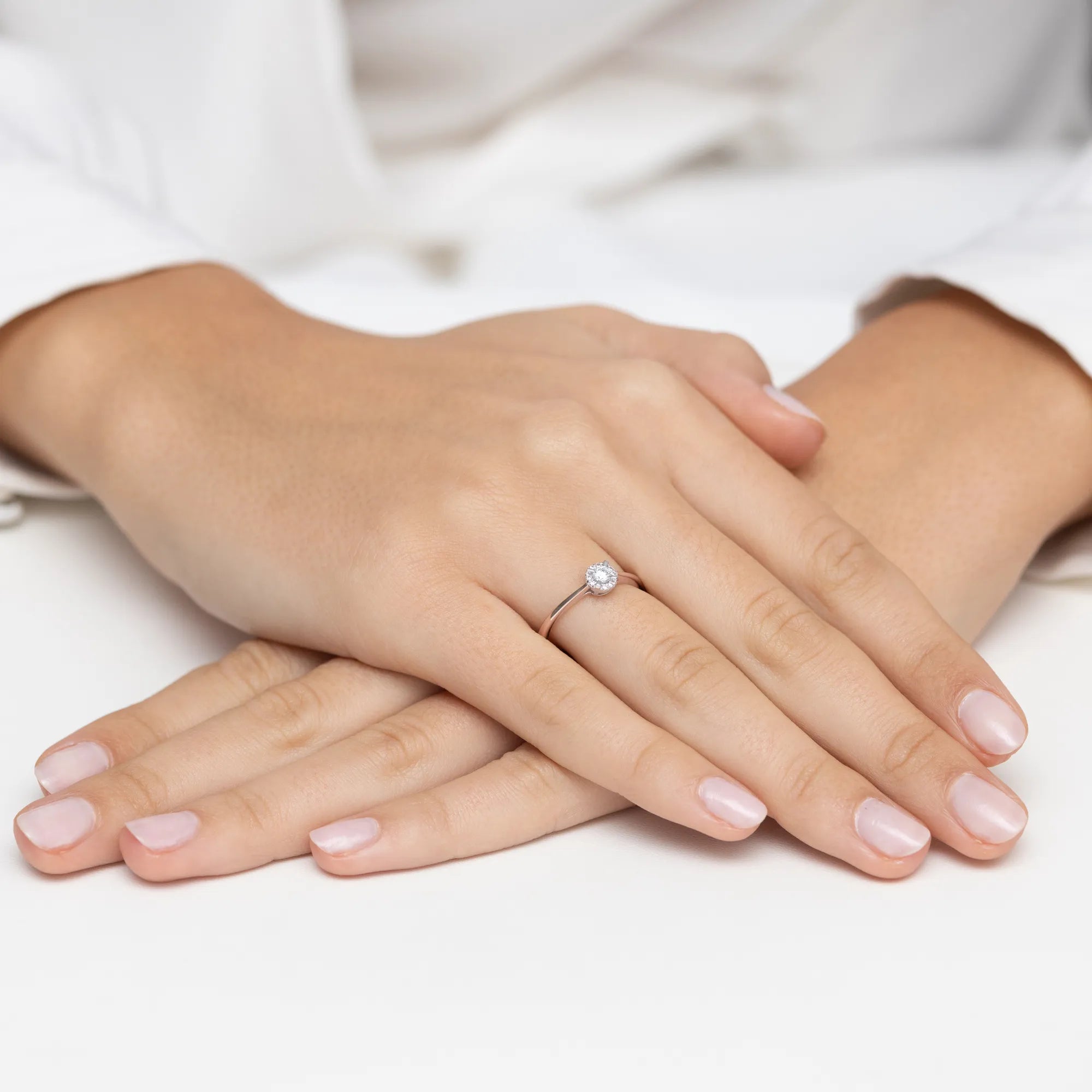 gold-ring-with-0-10ct-diamond-and-0-04ct-sideline-diamonds-w0560-diw-01