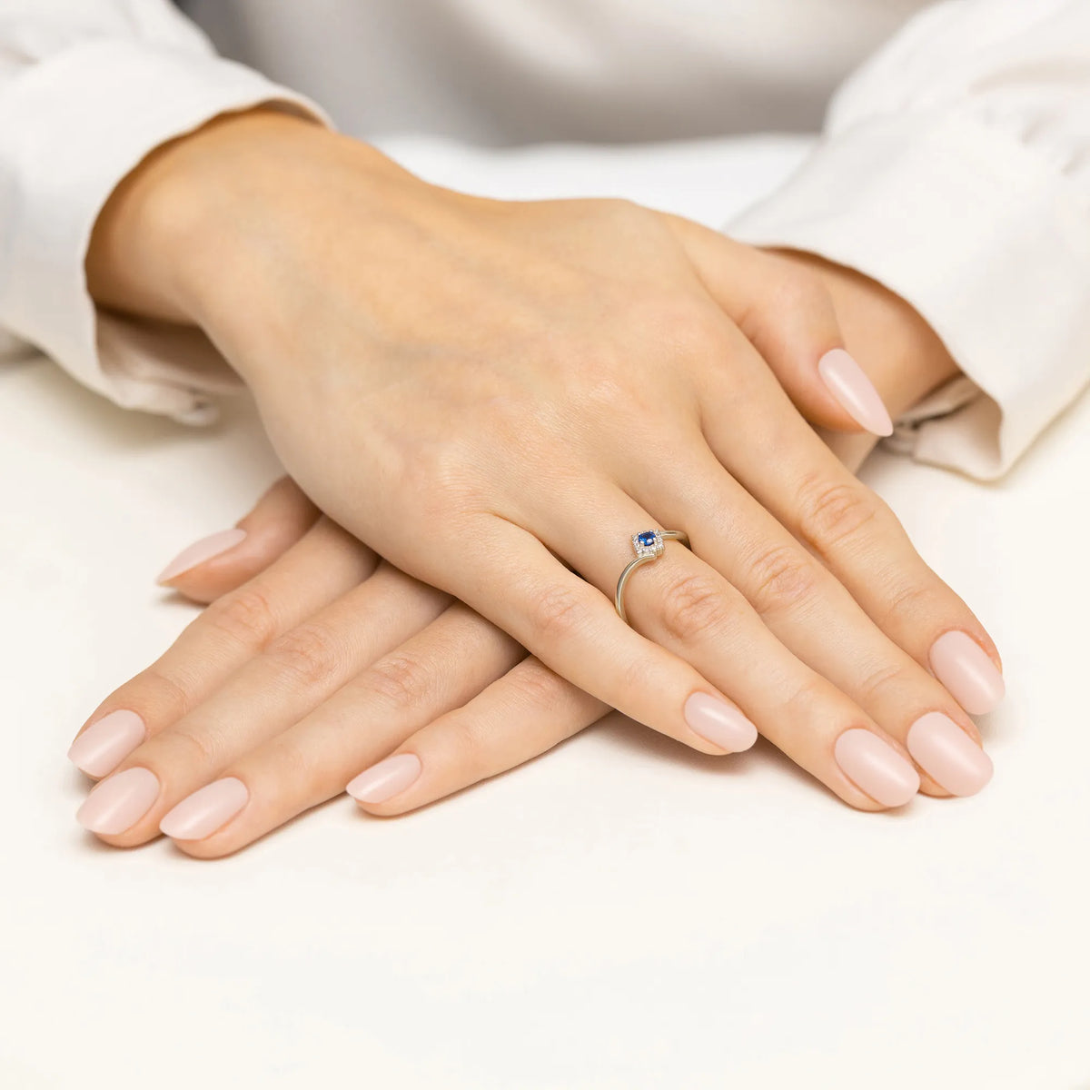 gold-ring-with-0-15ct-sapphire-and-0-06ct-diamonds-w0702-sab-01