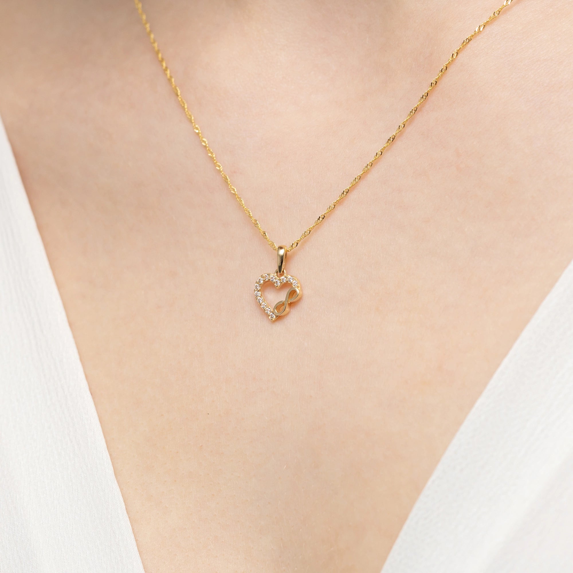 zweifarbiger-goldanhänger-mit-drei-ringen-z-gw-387-585