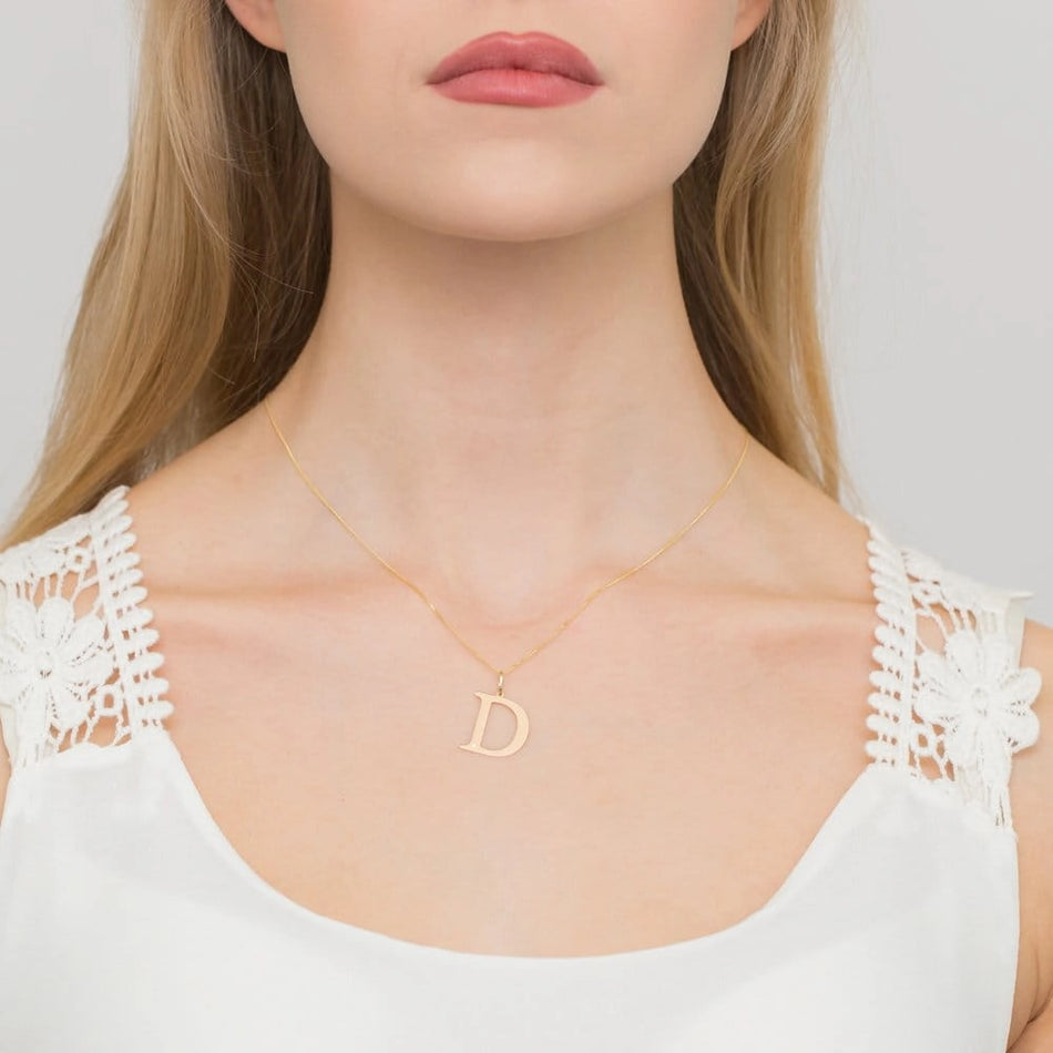 Großer Gelbgold-Anhänger mit Initiale „D“ und Diamant
