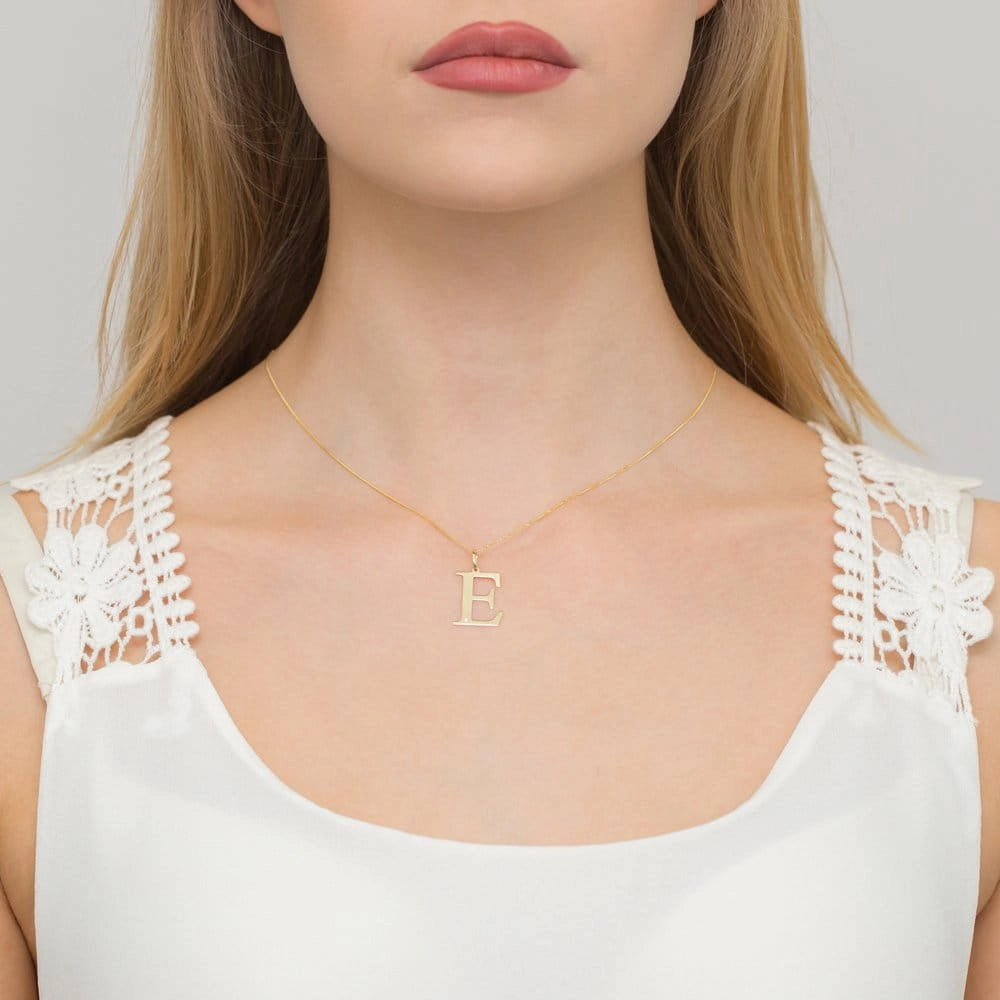 Großer Gelbgold-Anhänger mit Initiale „E“ und Diamant