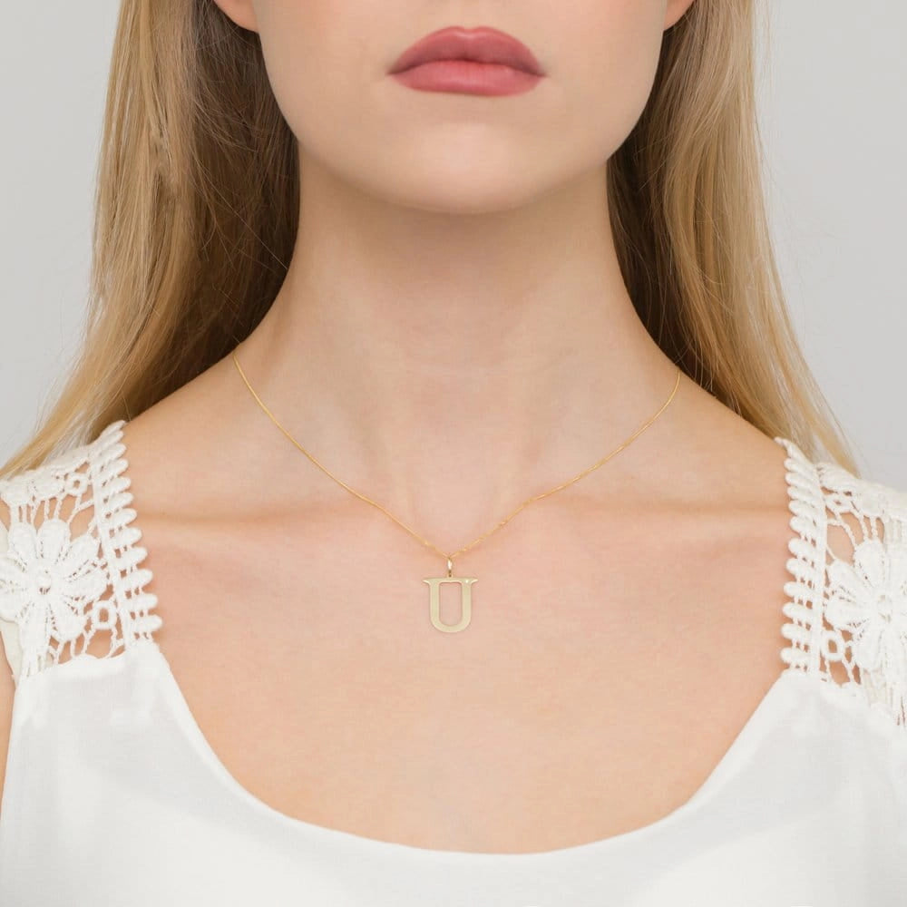 Großer Gelbgold-Anhänger mit Initiale „U“ und Diamant