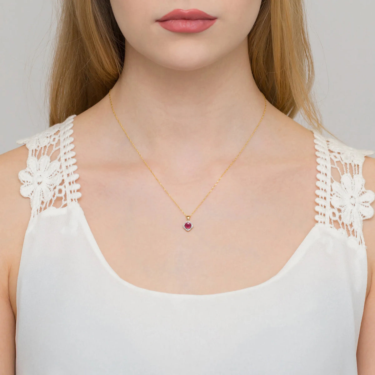goldanhänger-mit-0-60ct-rubin-und-0-06ct-diamanten-z0571-rur-01