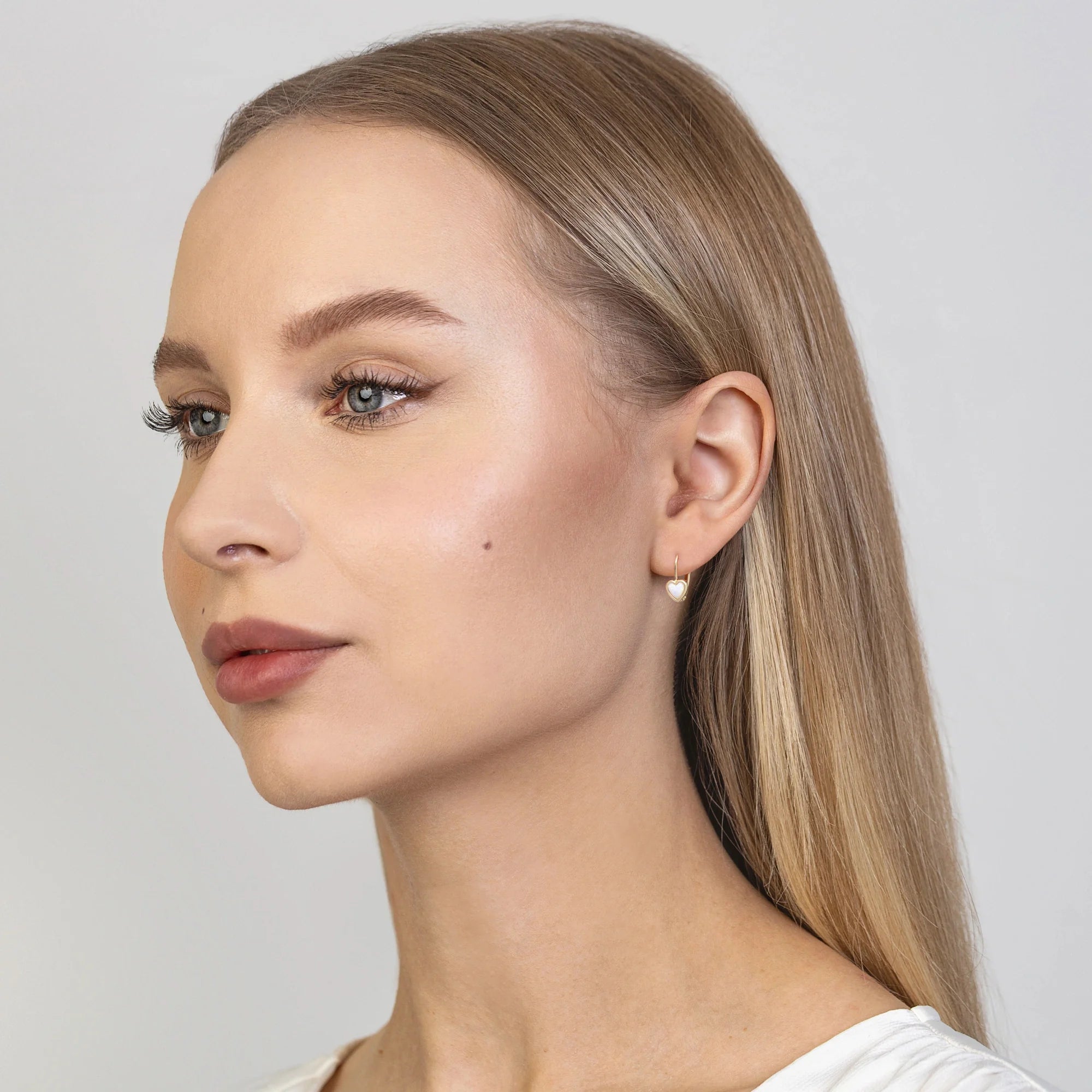 These heart shaped 14-carat gold earrings are an exclusive accessory. Our earrings are a stud clasp. Earrings are packaged in elegant box, perfect for a gift