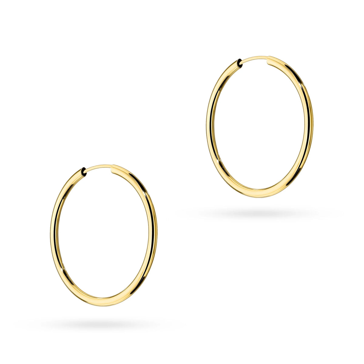 These classic hoop 14-carat gold earrings are an exclusive accessory. Our earrings are a stud clasp. Earrings are packaged in elegant box, perfect for a gift