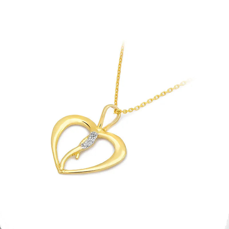 Gold 14k(585) heart-shaped pendant with 0.026ct diamonds. Make someone you love happy.