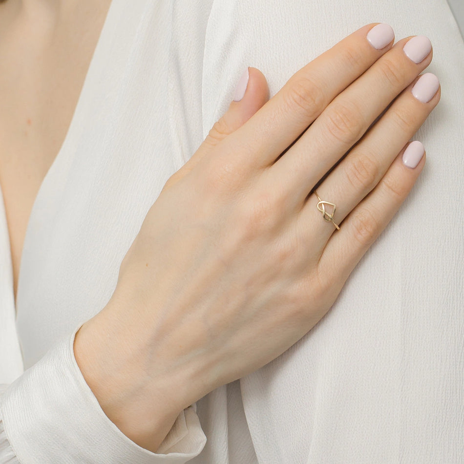 Gold 14k(585) heart-shaped ring.  Is packaged in an elegant box, which is perfect for giving as a gift. 