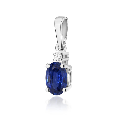 White Gold pendant with oval sapphire and additional diamonds.