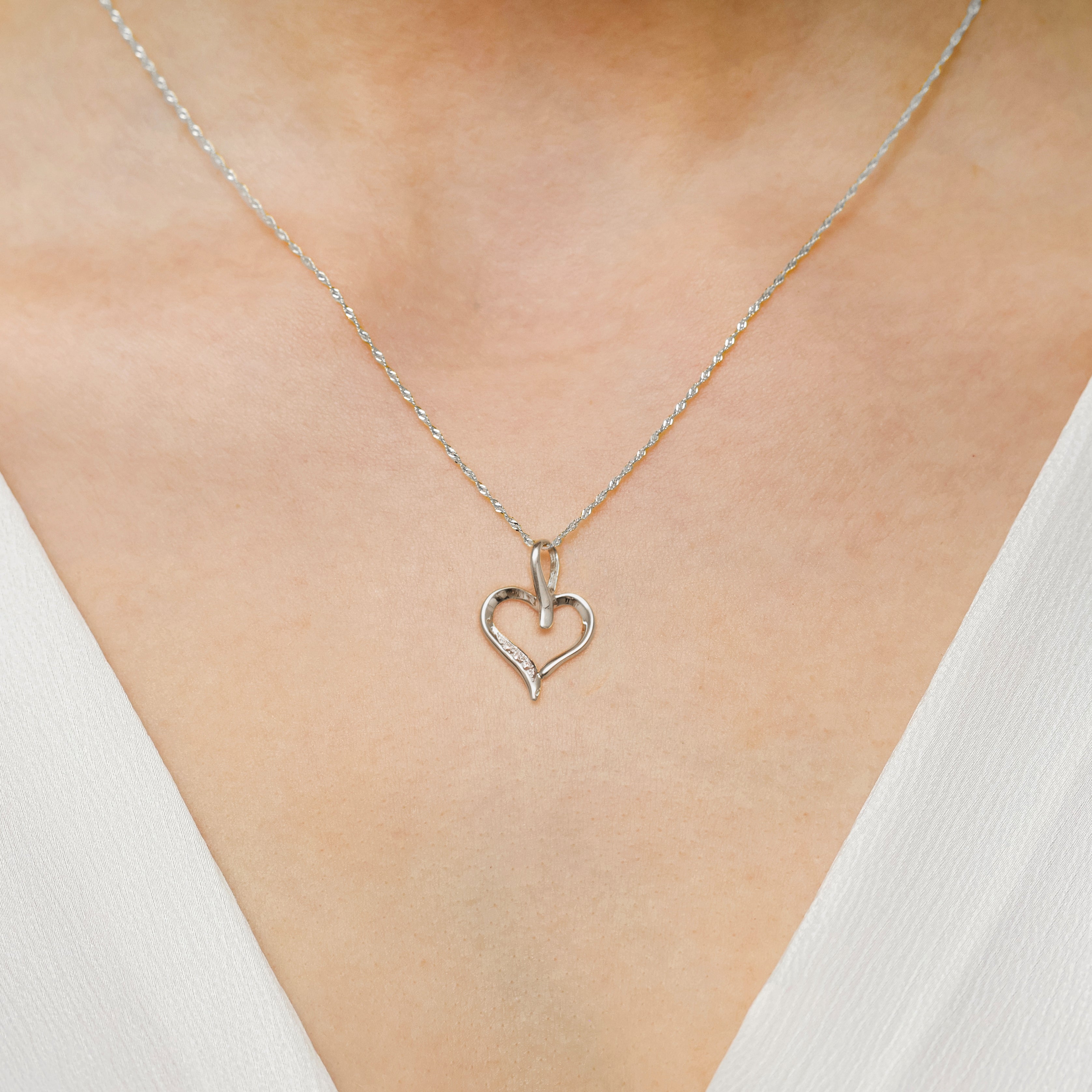 White Gold heart-shaped pendant with embedded 0.015ct  diamonds. Uniq gift for loved once.