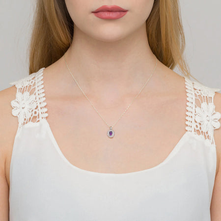 Pendant made of 14K (585) gold. Central amethyst 0.40ct surrounded by 39 diamonds 0.19ct. A unique gift for her. Our shop offers chains, rings, earrings.